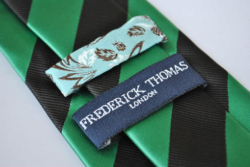green and black barber striped tie